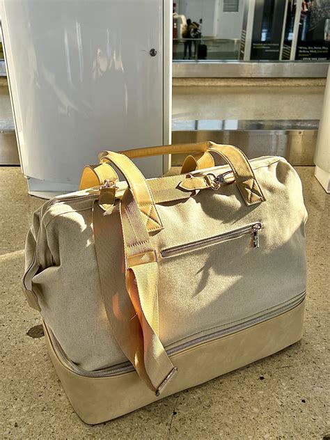 beis weekender bags for women.